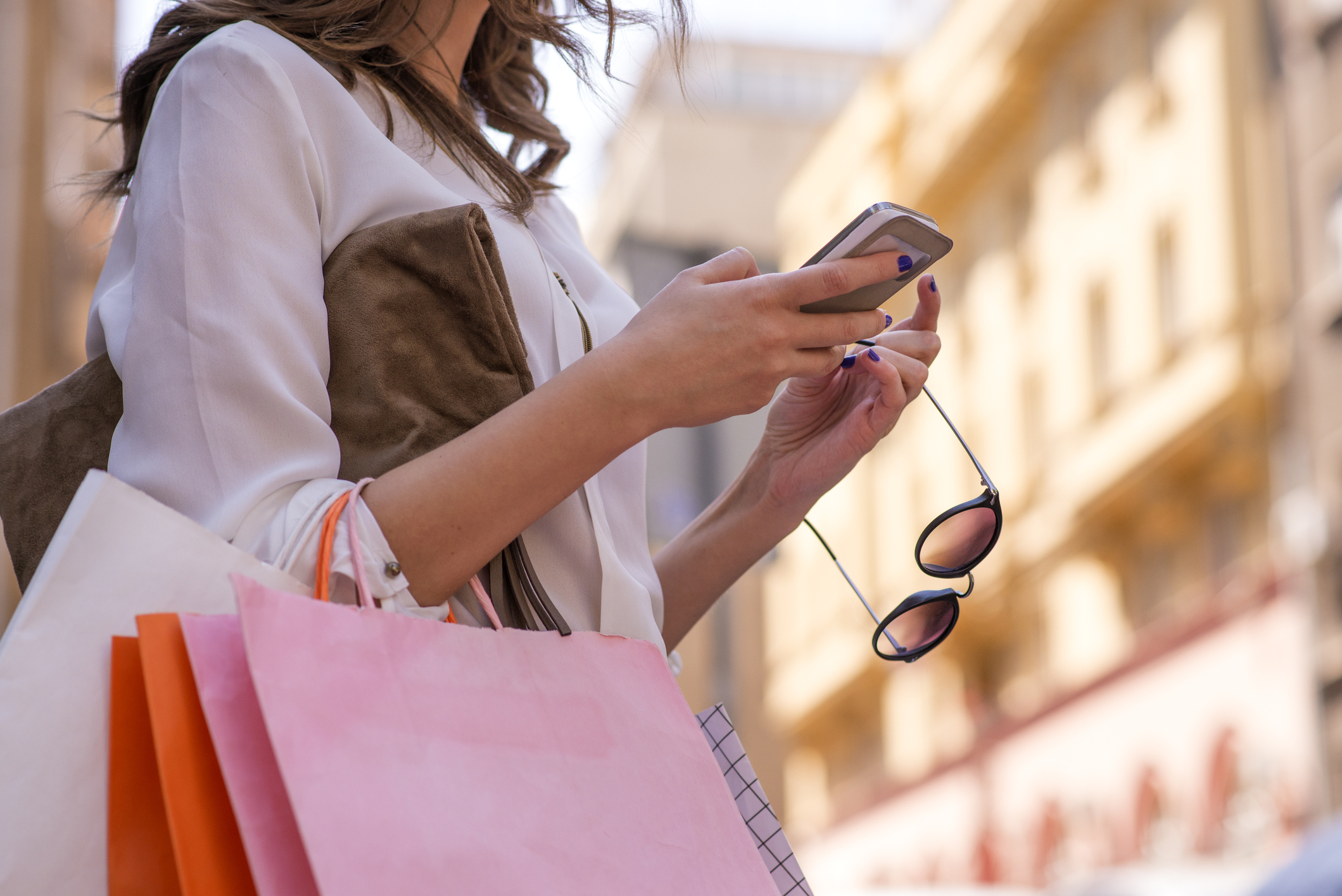 Shopper with mobile phone